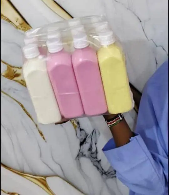 Yoghurt bottles: pink, yellow and white